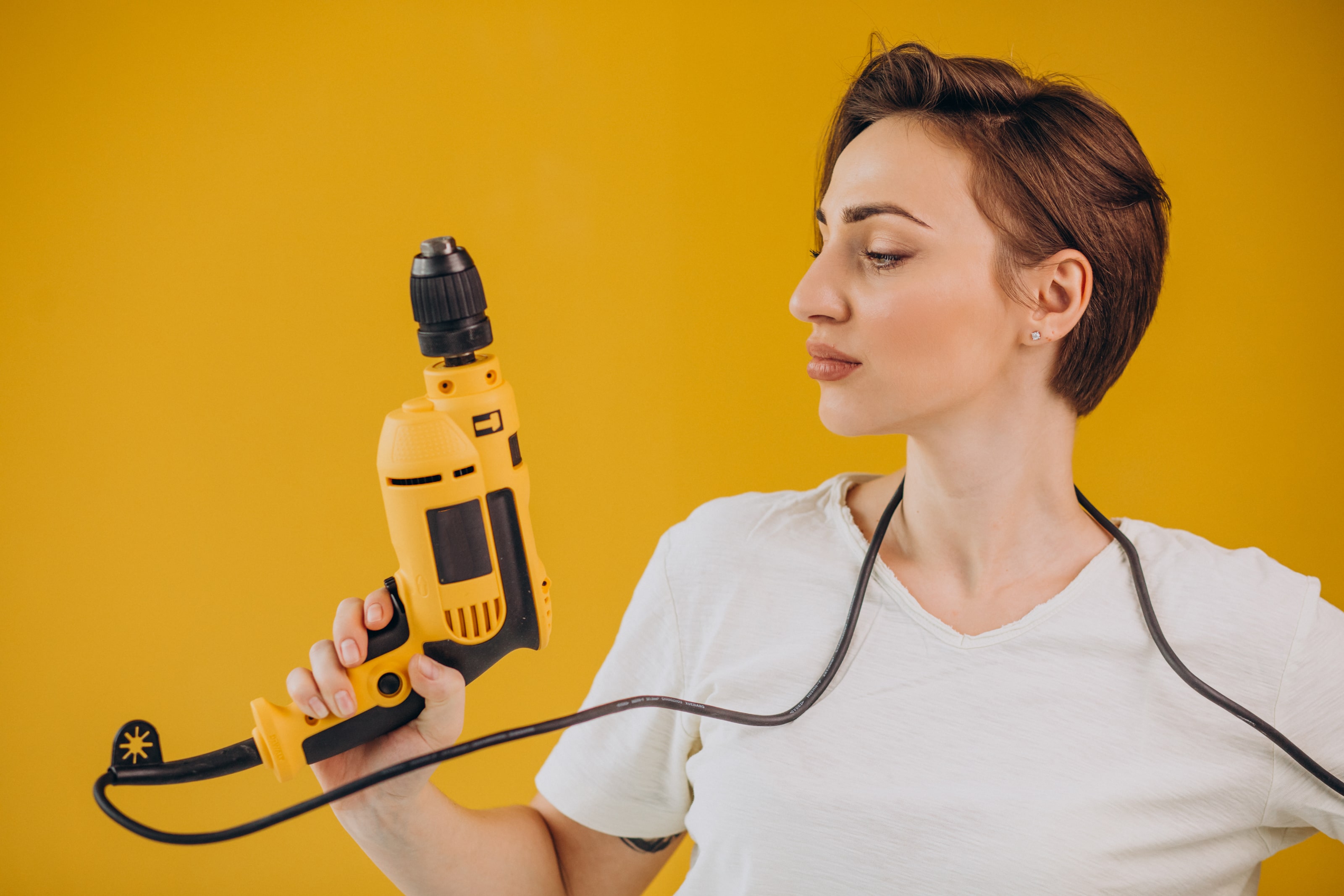 A corded hand tool with its mains cable